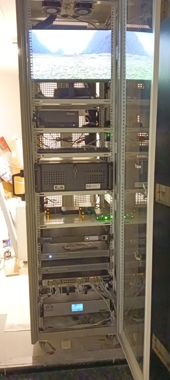 VELOtech equipment rack with structured cabling, patch panels and AV hardware