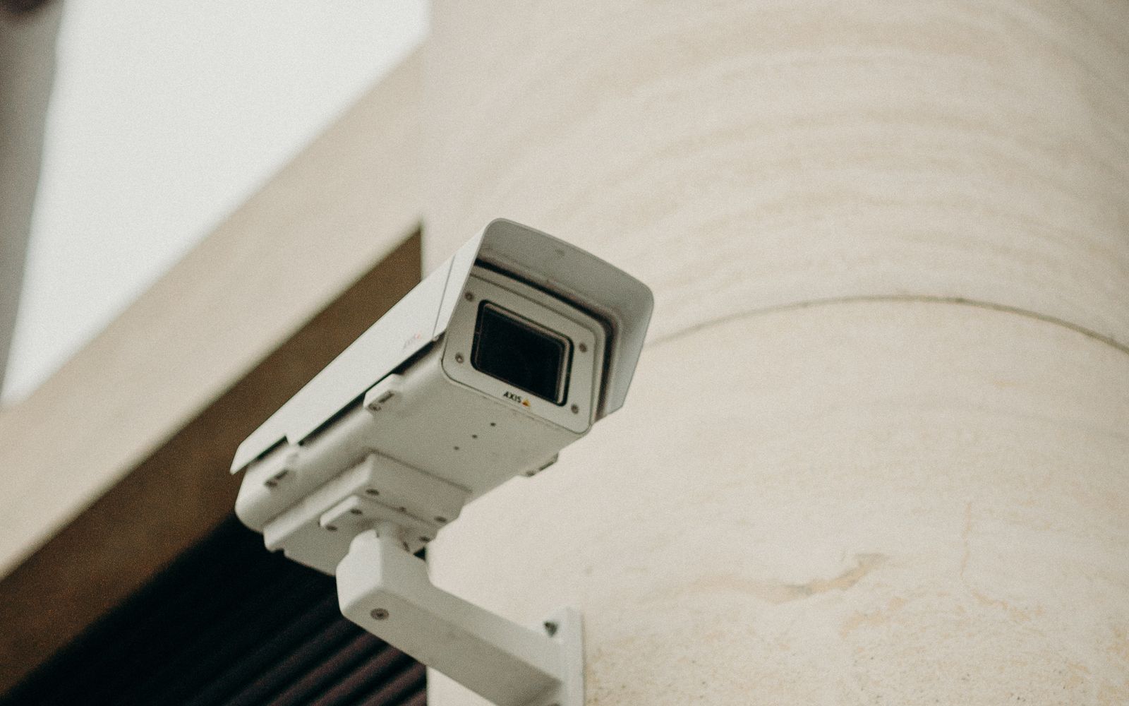 Professional IP security camera mounted on a building facade